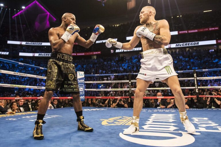 Fans mock Floyd Mayweather after his workout on the bag as he prepares for August 23 fight